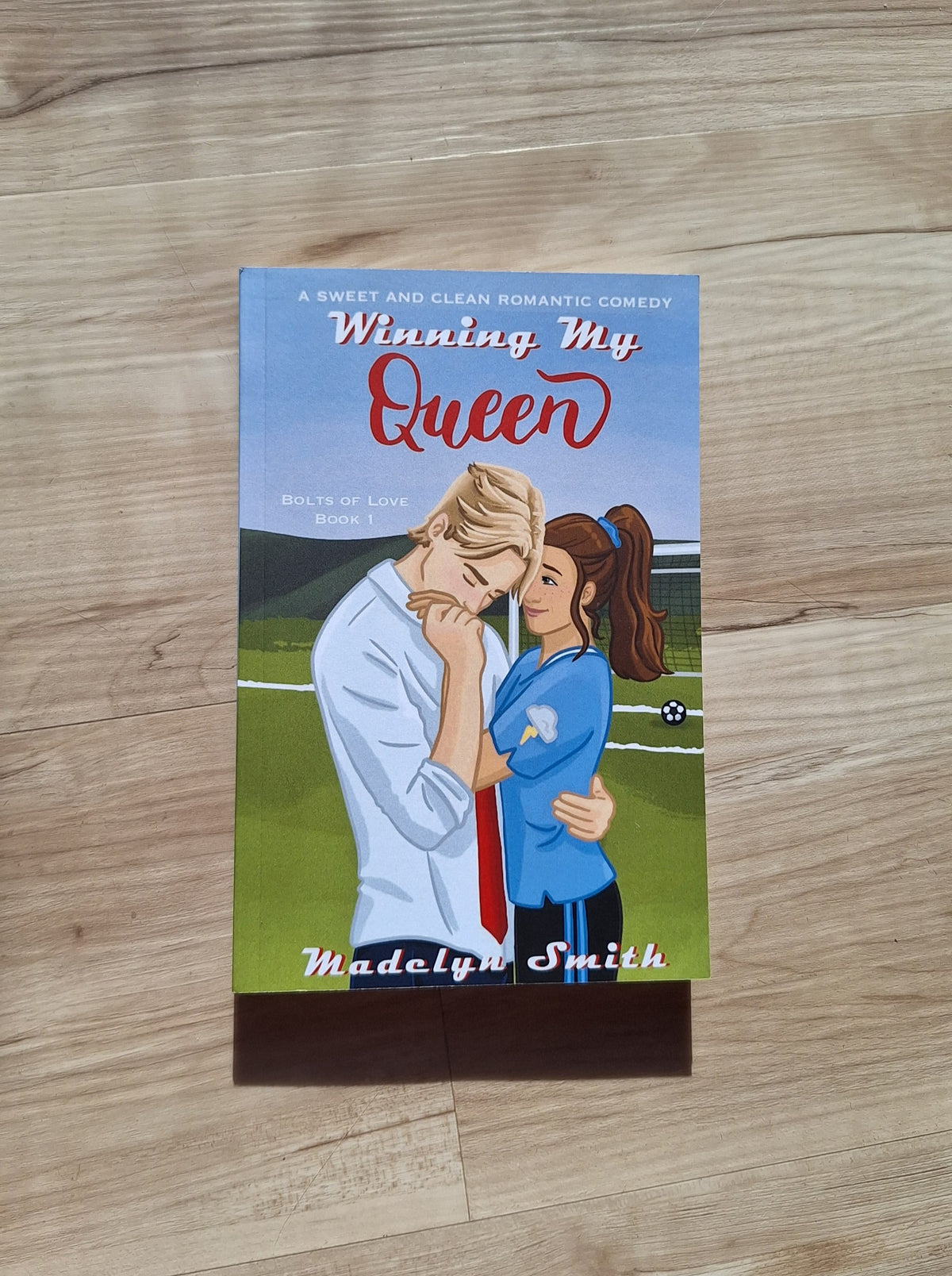 Winning My Queen paperback cover - sweet and clean romantic comedy by Madelyn Smith